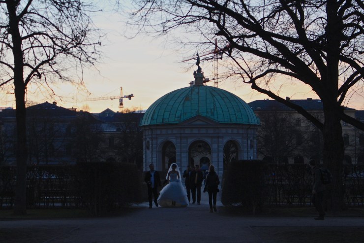 This bride was walking through the English Garden 